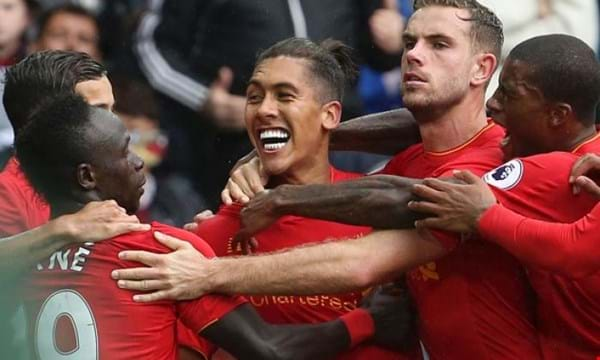 Liverpool beat Swansea 2-1 at the Liberty Stadium thanks to Milner penalty and Firmino goal 